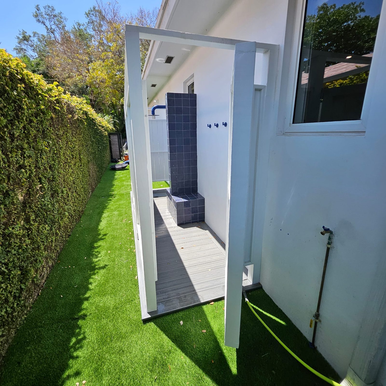 Completed outdoor shower enclosure